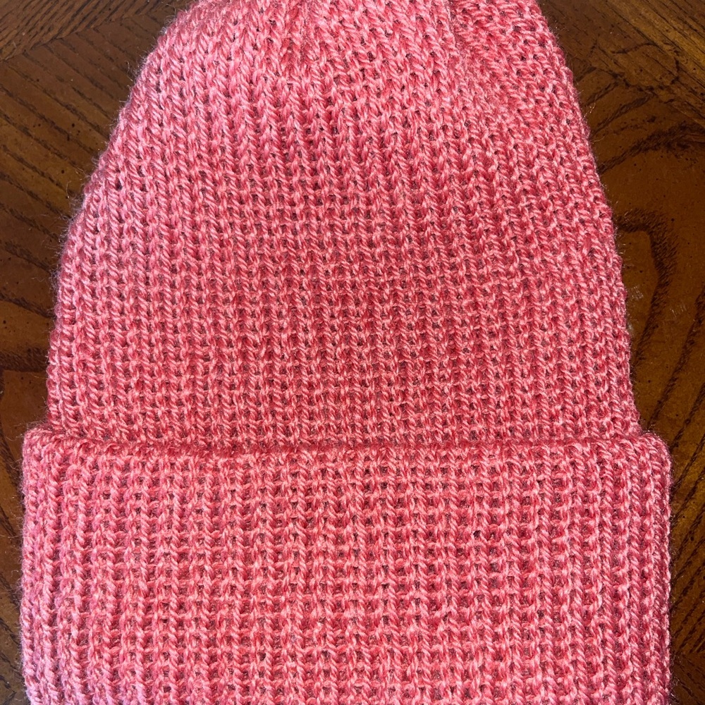 Pink knit beanie handmade from recycled plastic